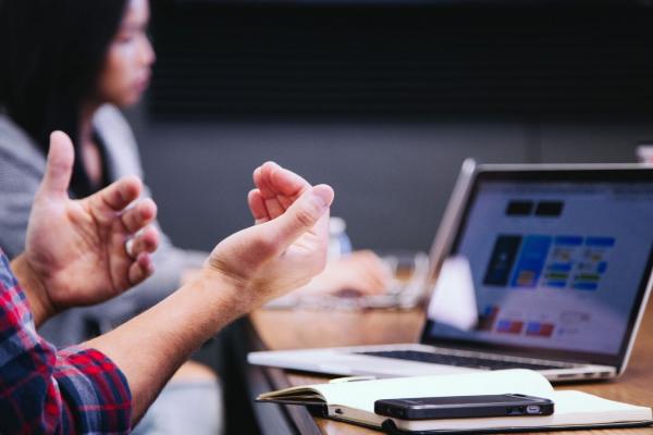 Hands in a meeting